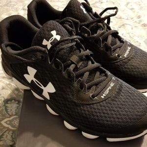Gently used pair of UnderArmour running shoes.
